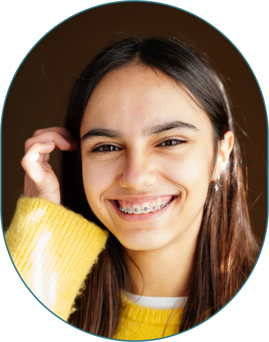 Smiling Teen Girl Wearing Braces in St. Louis, MO